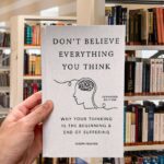 Cover of Don't Believe Everything You Think by Joseph Nguyen, featuring minimalist typography and a calming, reflective design.