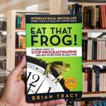 Cover of the book "Eat That Frog!" by Brian Tracy, featuring a green frog illustration and bold title text.