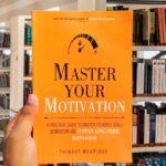 Cover of the book "Master Your Motivation" by Thibaut Meurisse, featuring a minimalist design with a fuel gauge pointing towards 'Full' and bold typography.