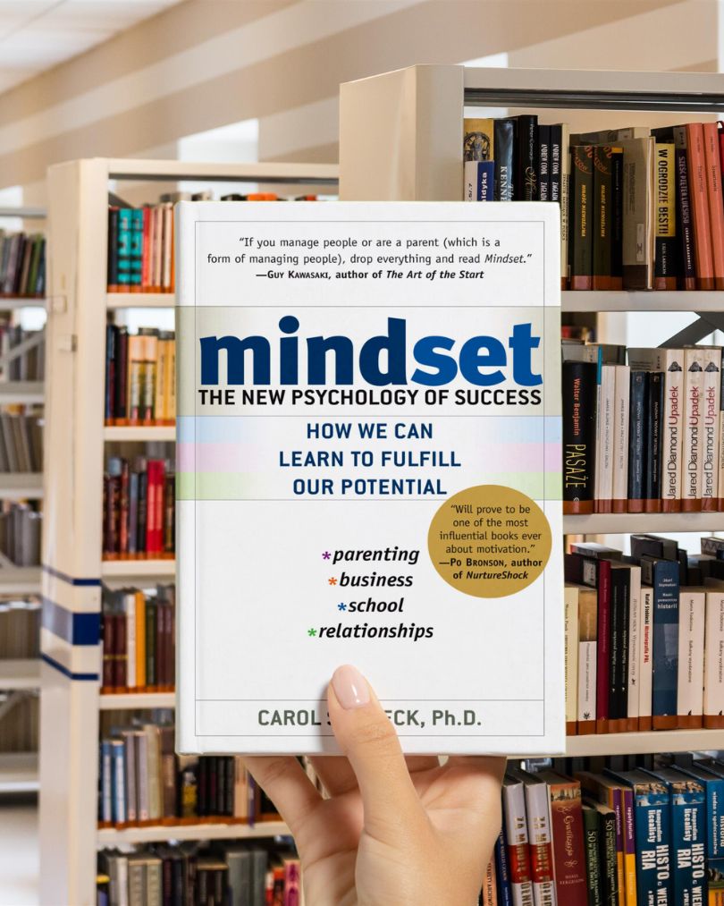 Cover of the book Mindset by Carol S. Dweck, featuring a clean white background with bold blue and green title text.