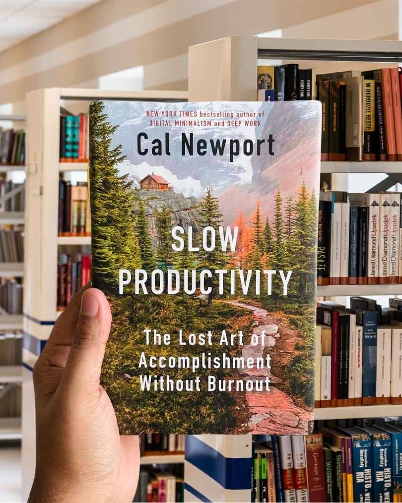 Cover of the book “Slow Productivity” by Cal Newport, featuring minimalist typography on a clean, modern background.