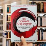 Cover of "The Courage to Be Disliked" by Ichiro Kishimi and Fumitake Koga, with bold minimalist typography on a plain background.