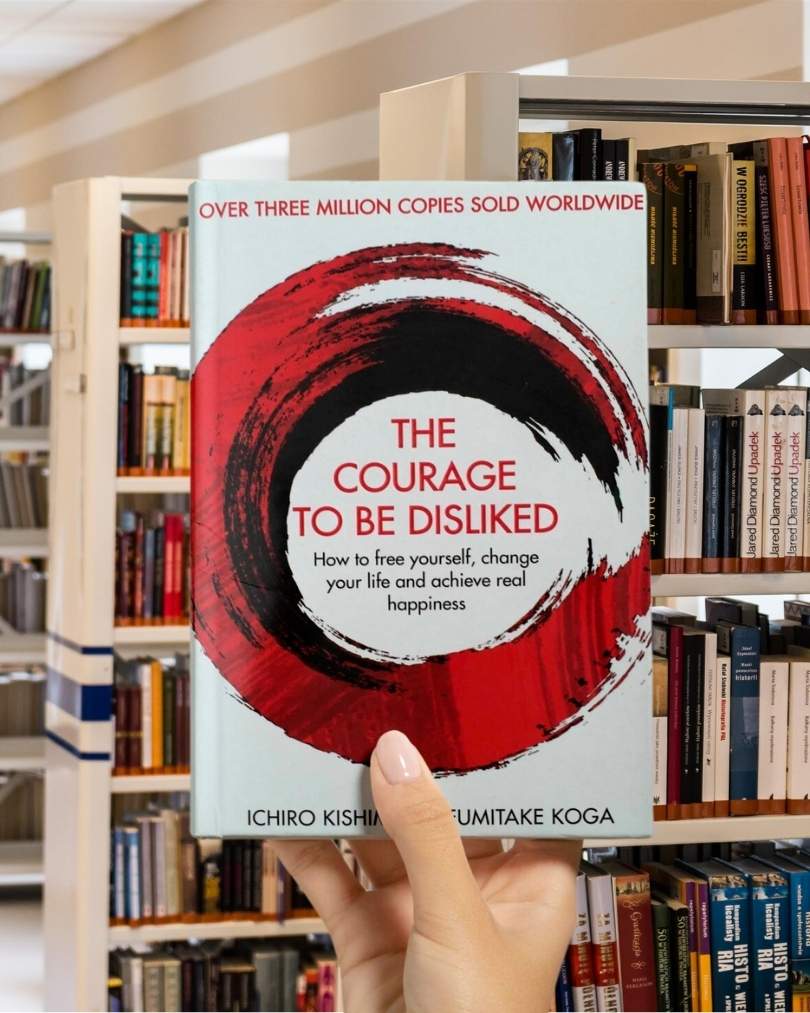 Cover of "The Courage to Be Disliked" by Ichiro Kishimi and Fumitake Koga, with bold minimalist typography on a plain background.