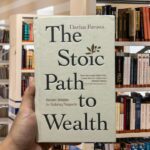 Cover of the book “The Stoic Path to Wealth” featuring minimalist design with classical elements and bold, elegant typography.