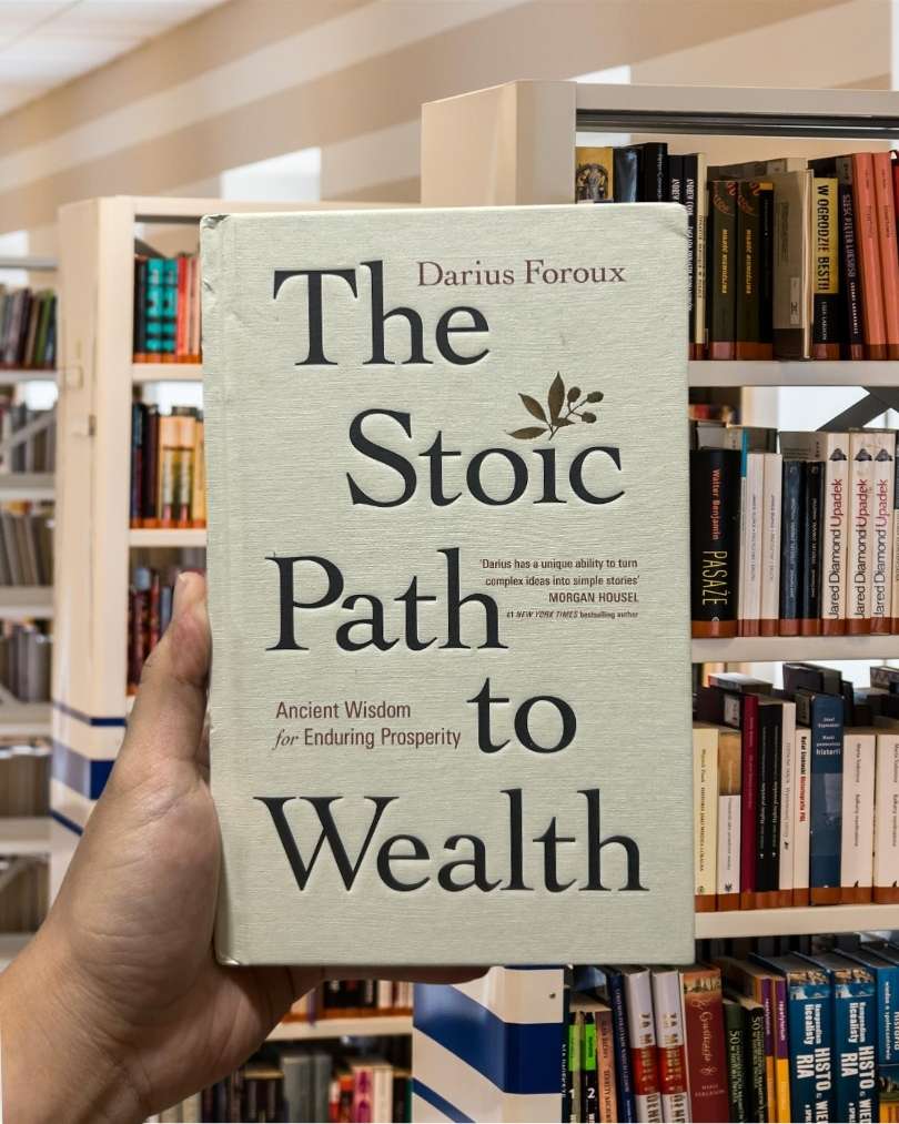 Cover of the book “The Stoic Path to Wealth” featuring minimalist design with classical elements and bold, elegant typography.