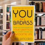 Cover of the book "You Are a Badass" by Jen Sincero with bold yellow background and modern black and white typography.
