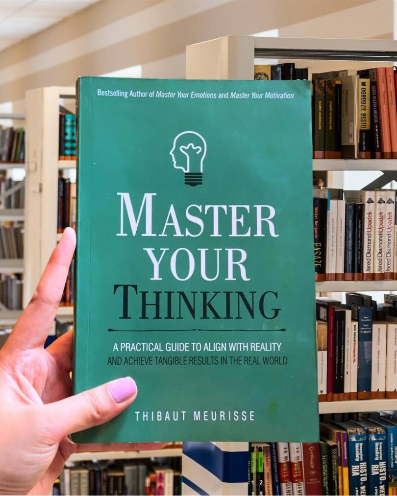 Cover of the book "Master Your Thinking" by Brandon Goleman featuring a dark blue background with a glowing brain illustration.